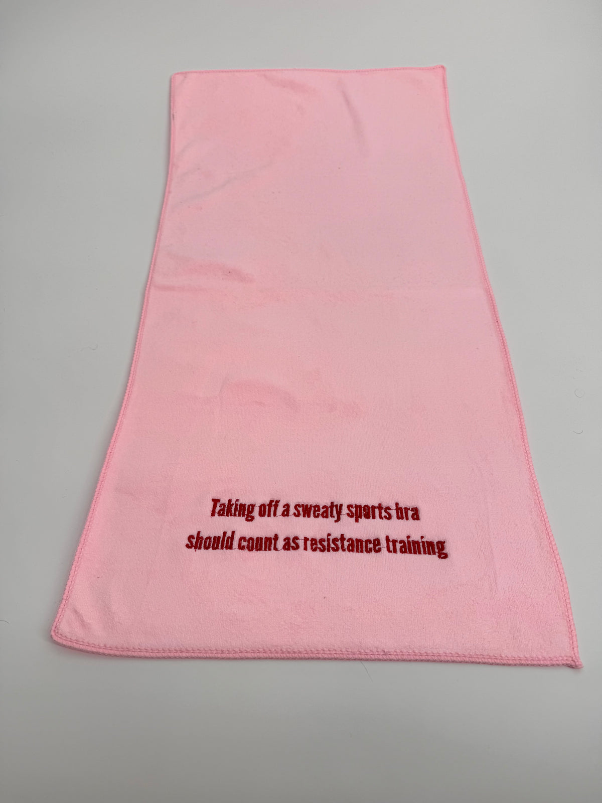 Taking off a sweaty sports bra should count as resistance training - Sweat Towel